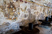 The great Chola temples of Tamil Nadu - The Brihadishwara Temple of Thanjavur. Linga with Nayaka painting on the inside wall of the cloister. 
